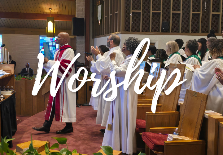 Picture of pastors and choir members clapping their hands